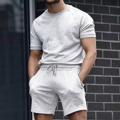 China Custom Anti-Wrinkle QYOURE Drawstring T-Shirt Logo French Terry Cloth Fitness Casual 2 Piece Cotton Sweat Men's Short Set for sale