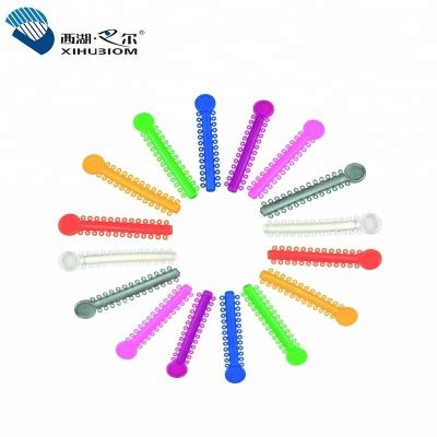 China Class II Dental Orthodontic Elastic Ligature Tie For Brace 26 Loops for sale