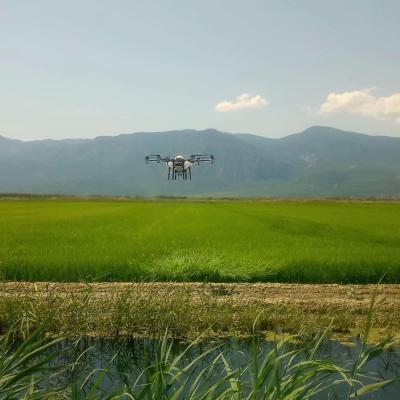 China Tta 6 Rotores Drones/Uav Drone Agrícola Dobrável Pulverizador de Drones 10kg Carga Útil e Mini Câmera à venda