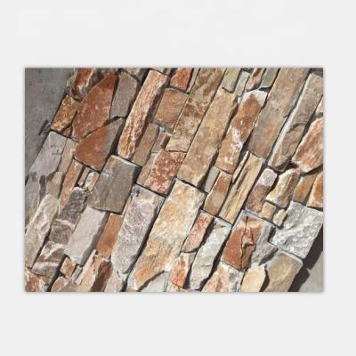 China Traditional Split Exterior Finishing And Color S Shape Yellow Stone Wall Panel for sale