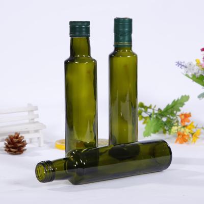 China Wholesale Empty Food Olive Oil Bottle Container Can Amber Round Olive Oil Glass Bottle With Caps for sale