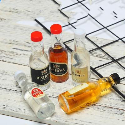 China Bulk Wine Bottles 40ml Beverage Small Portable Empty Glass Whiskey Vodka Rum Whiskey Bottle Mini Beverage Tequila Bottles for sale