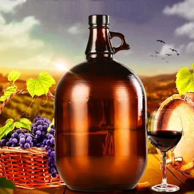 China 132oz Amber Glass Beverage Bottle For Juice Milk Beer Shaker 4L Round Glass Empty Kombucha Water Jug for sale