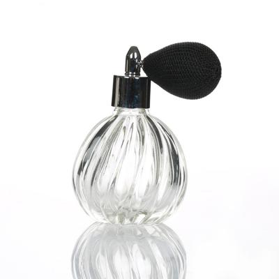 China Vintage Atomizer 50ml Luxury Empty Refillable Spray Cosmetic Clear Oval Glass Perfume Bottle for sale