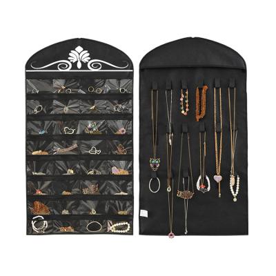 China Promotion Jewelry Hanging Organizer Holder 32 Nonwoven Pockets 18 Hook And Loops for sale