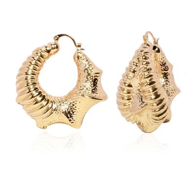 China Durable Retro Exaggeration Copper Earrings Gold Plated Hoop Earrings Chunky Irregular Earrings Women for sale