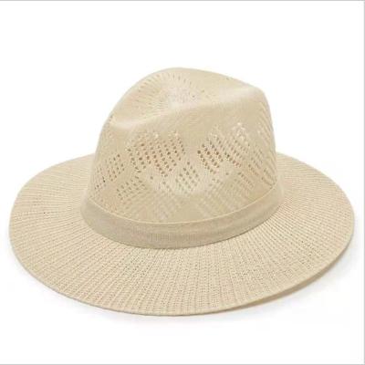 China Outdoor sun protection hollow wide brim straw hat eco-friendly summer new and sun UV protection hat high quality beach hat for sale