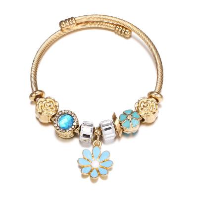 China Environmental Friendly 18K Gold Plated Stainless Steel Bracelet Enamel Daisy Flower Crystal Rhinestone Beads Charm Bracelet for sale