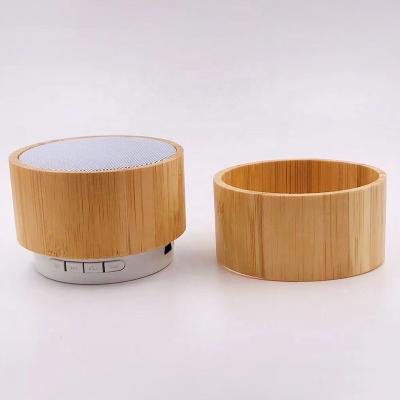 China Promotional Colorful LED Light and Business Gifts Blue-tooth A10 Mini Portable Wooden Speaker Blue-tooth Wireless Speaker for Sale for sale