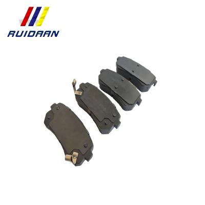 China Semi-metal/low-metal tip red brake pads/full metal auto brake pads D1157 for sale