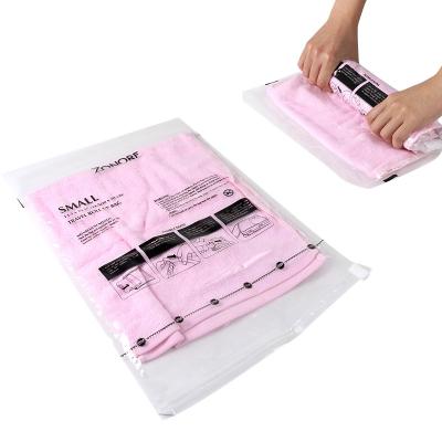 China Sustainable Hand Roll Space Saver Bag Travel Vacuum Storage Bag for sale