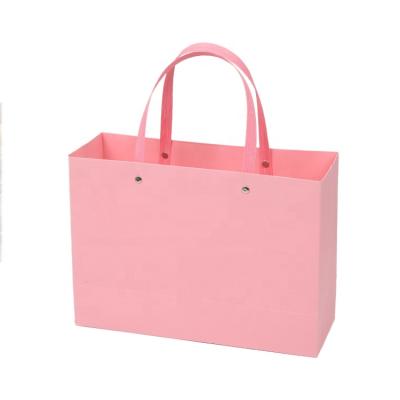 China Recyclable Clothes Paper Bag For Lady Clothes Art Paper Bag Cloth Carrier Paper Bag for sale