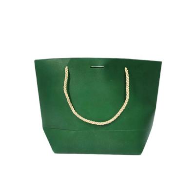 China Recyclable Wholesale Custom Logo Gift Bags Dark Green Bottom Tote Bags With Butterfly Strap for sale