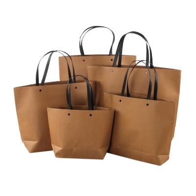 China Wholesale High Quality Durable Recycled Kraft Paper Shopping Bag With Handle for sale