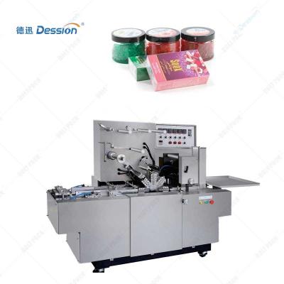 China The automatic transparent food film cellophane raisin box packing machine with gloden line for sale