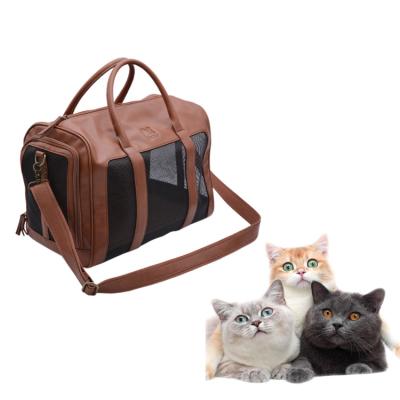 China Durable Luxury Waterproof PU Leather Pet Carrier Handbag Dog Cat Cage Carrier for sale