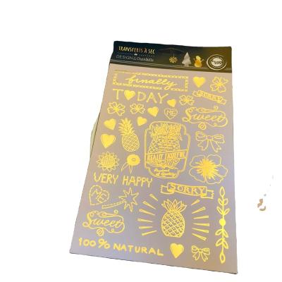 China Wine/Bottle/Cosmetics Anti-Counterfeiting Custom Transparent LOGO Sticker Gold Foil Transfer Heat Transfer Logo Printing Clear Label for sale