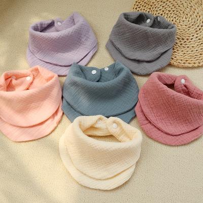 China Customzied Newborn Baby Muslin Tassels Bibs Solid Gauze Saliva Towel Crepe Triangular Bib Burp Cloths for sale