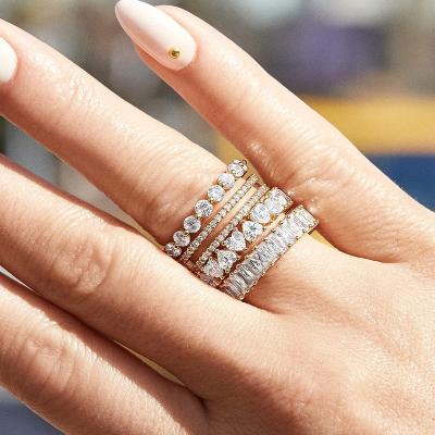 China CLASSIC High Quality Gold Plated Titanium Steel Baguette Rings Bling Bling Zircon Pave Rings For Women for sale