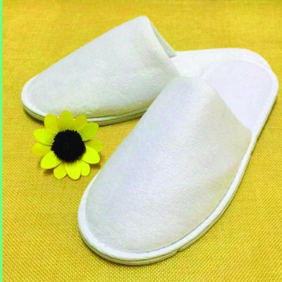 China 2022 high quality hotel disposable slippers in stock one time factory sale white color closed toe velvet slippers, indoor hotel disposable slippers for sale