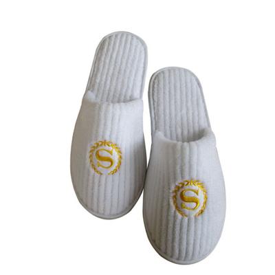 China Disposable Hotel Slippers New Customize Coral White Color Strip Velvet Slippers Luxury Hotel Supplies With Narrow Toe for sale