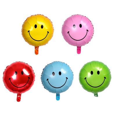 China 18 Inch Multi Color Round Foil Balloon Decoration Shape Macaron Smile Expression Foil Balloon for sale