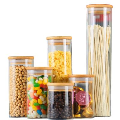 China Sustainable Airtight No Smell High Borosilicate Glass Jar With Lid Storage Bamboo Wooden Bottles And Jars for sale