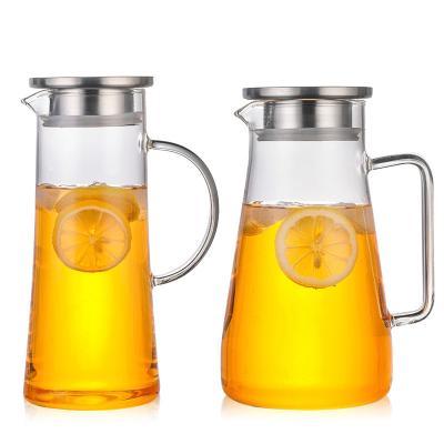 China Sustainable Family Drinking No Lead Glass Water Jug Handblown Clear Glass Pot Heat Resistant Carafe With Silicone Lid for sale