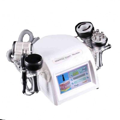 China Skin Tightening Portable RF Cavitation Vacuum Slimming Equipment Whole Body Weight Loss And Skin Tightening Have Hot And Cold Hammer For Face for sale