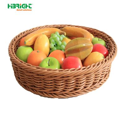 China Multifunctional Round Fruit Display Rattan Basket PE Plastic Wicker Promotion Basket for sale