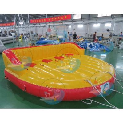 China 0.9mm PVC Tarpaulin Hot Water Sports Inflatable Water Floating Sofa Towable Tube Inflatable Trampolines for sale