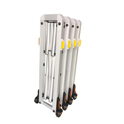 China Movable Manually Push And Pull Aluminum Manual Arcade Barrier Security Accordion Fence Gate for sale