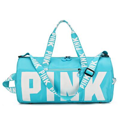 China Pink Gym Women Logo Large Capacity Customized Waterproof Duffel Bags Sports Travel Duffel Bag for sale