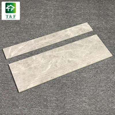 China Rustic Gray Color Home Polished Porcelain Stair Tiles Tiles With Decorative Strip Ceramic Floor Tiles for sale