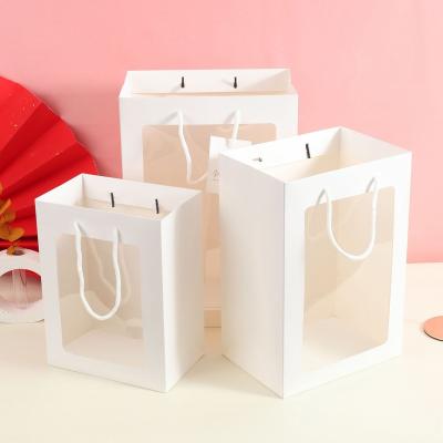 China Recycled Brown Series Printed Materials Flower Bakery Food Packaging Grocery Craft Gift Bread Kraft Paper Bag With Clear Window for sale