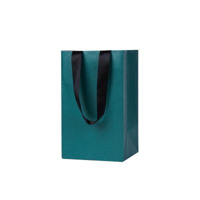 China Recycled Materials Custom Luxury Black Clothes Store Retail Packaging Gift Carry Bags Boutique Shopping Paper Bags With Your Own Logo for sale