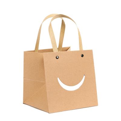 China Custom Made Recycled Materials Clothing Shopping Bag Gift Paper Bag Packaging With Handle Luxury Bags For Wedding / Jewelry / Cosmetic for sale