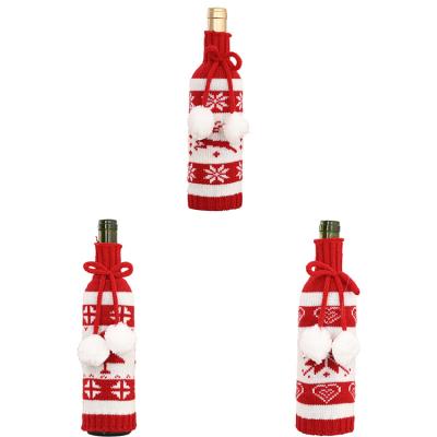 China 2021 Hot Selling Christamas Home Decoration Knitted Double Ball Cord Christmas Wine Bottle Cover For Table Decorations for sale