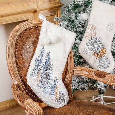 China 2021 Fashion Christmas Plush Luxury White Snowflake Embroidery Tree Hanging Stockings for sale