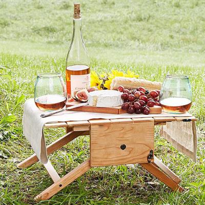 China 2022 OEM Convenient BBQ Idea New Product Foldable Outdoor Wooden Wine Carrier Camping Portable Bamboo Picnic Table With Glass Rack for sale