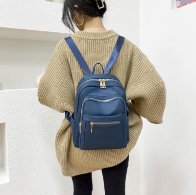 China 2021 new wave waterproof female Korean fashion backpack Oxford cloth school bag casual large capacity female backpack for sale