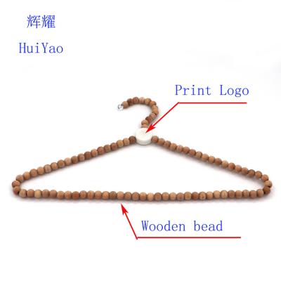 China Sustainable Hot Selling Wooden Bead Hanger for sale