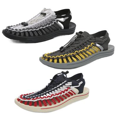 China 2022 Summer Flat Shoes Non-slip Outdoor Sandals Beach Water Woven Casual Breathable Hollow Shoes For Men for sale