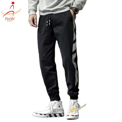 China Autumn new men's cotton waist trend elastic cargo pants sports pants Harlan pants for sale