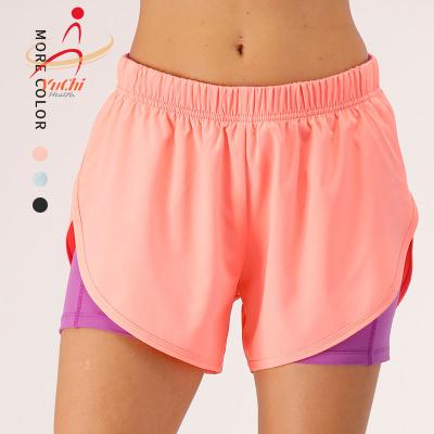 China 2021 Breathable Women Gym Leggings With Pockets Seamless Fitness Workout Yoga Shorts Running Shorts for sale