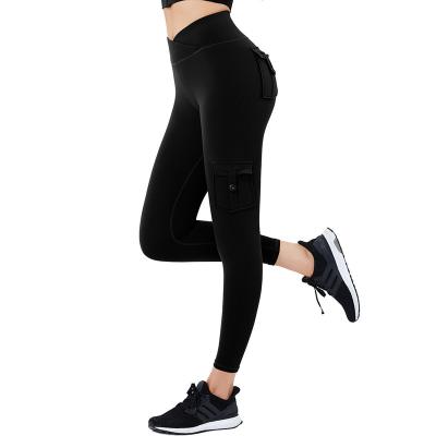 China Autumn sports new cargo pocket high waist breathable elastic buttocks lift sexy sports fitness pants woman for sale