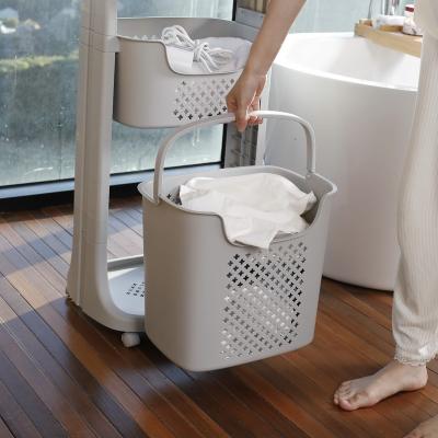 China Modern Wholesale Household Goods Clothing Bathroom Layered Plastic Laundry Basket With Handle for sale