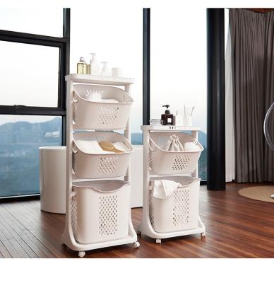 China 2022 Modern Hot Sale Customizable Logo Home Bathroom PP 3 Compartment Laundry Basket With Wheels for sale