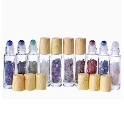 China Hot Selling Cosmetic Hot Selling Natural Colorful Jade Roller Bottles Portable Luxury Essence Bottle Glass for sale