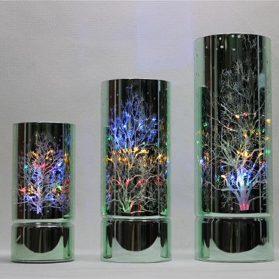 China Trendy Glass Led Cylinder Light Home Decoration Green Glass With Colorful Light And Willow Laser Cut for sale